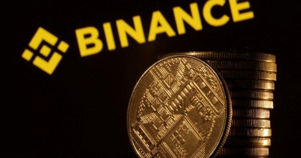 Логотип криптобиржи Binance на экране смартфона